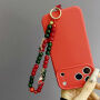 Świąteczna zawieszka z koralikami i przywieszkami do zamocowania na etui do iPhone - Santa Clause